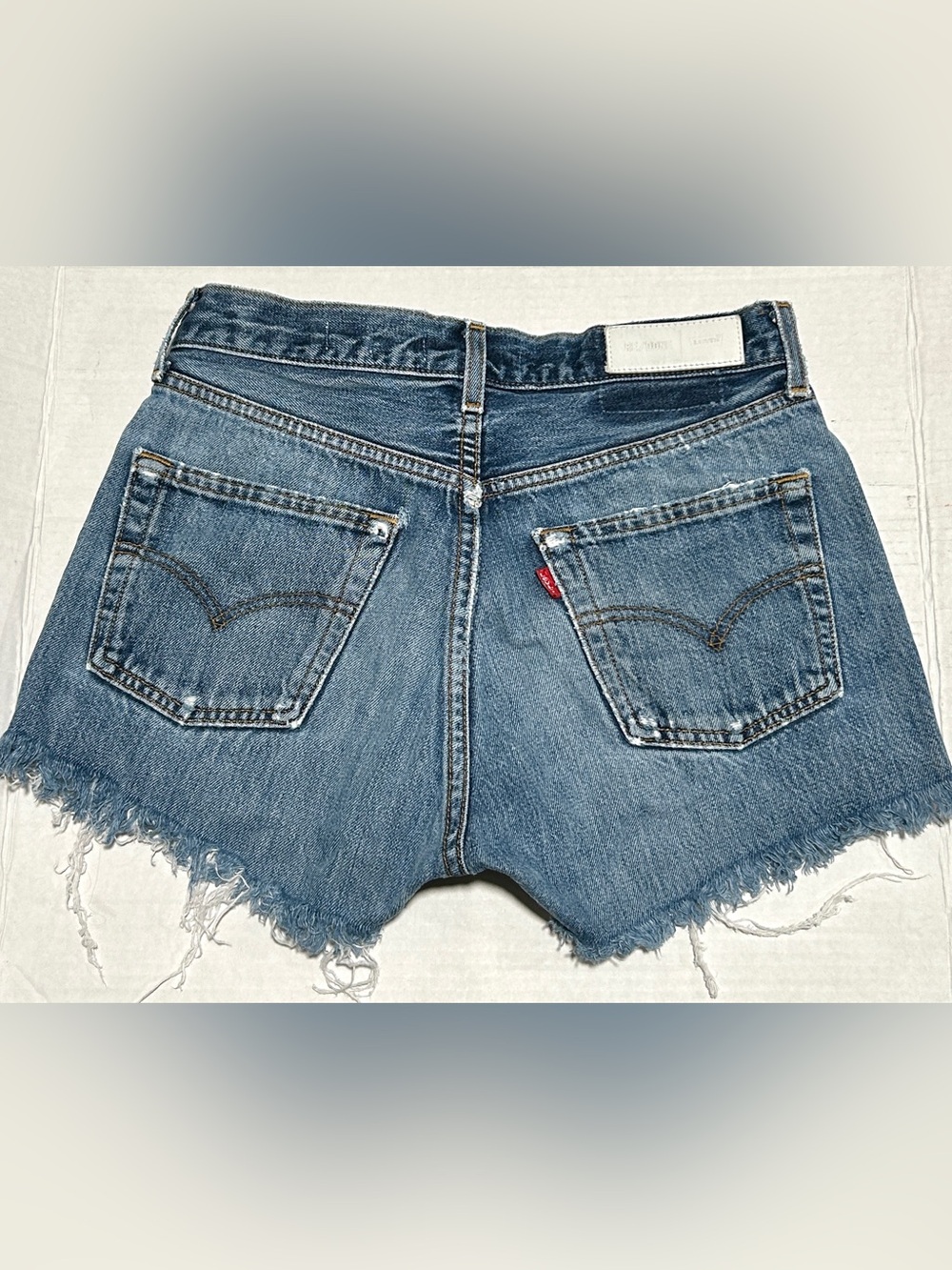 Re/Done Medium Blue Cutoff Denim Shorts with Frayed Hem